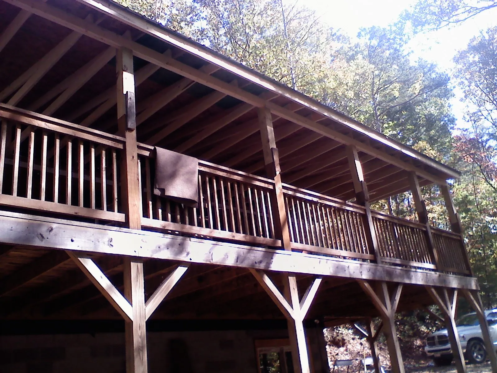 Timber framing under a new elevated porch and deck — Roof Leak Repair in Yellow Pine by Roofing Brothers